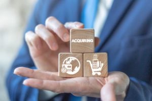 Acquiring,Online,Internet,Marketing,Business,Concept,On,A,Wooden,Blocks
